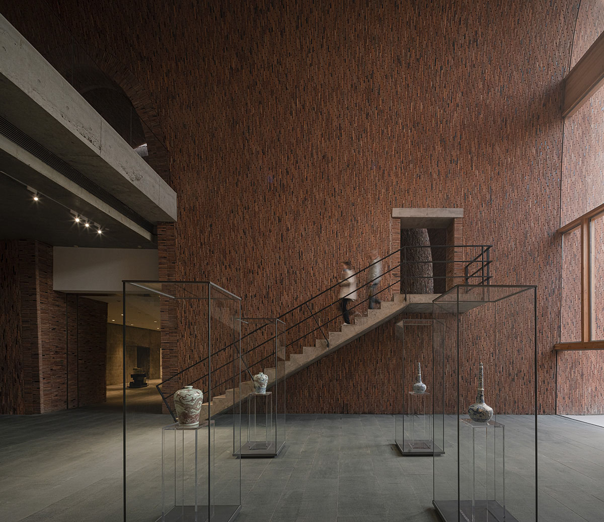 5-22-An atrium is located at the end of permanent exhibition circulation adjacent a sunken courtyard